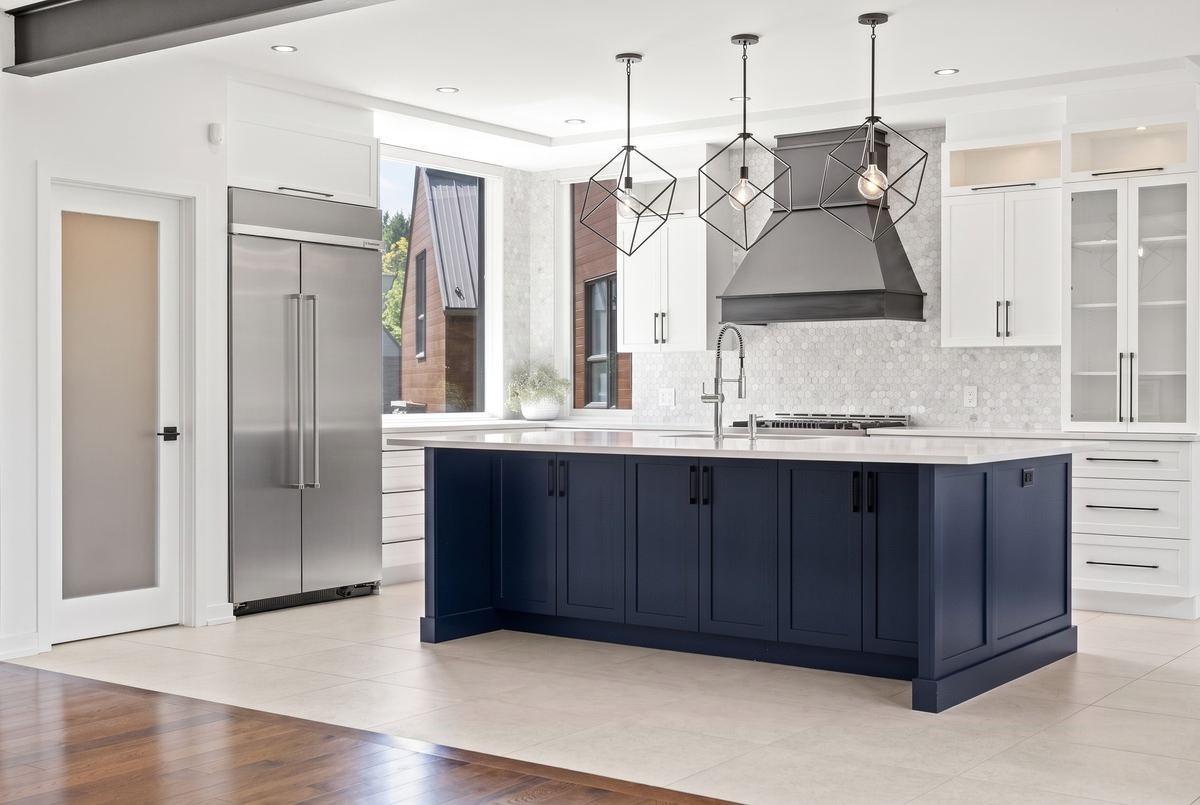 The same kitchen, island repainted navy blue